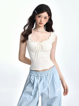 Slim textured edge knot top