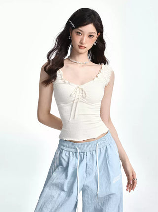 Slim textured edge knot top