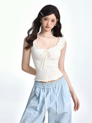 Slim textured edge knot top
