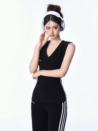 V-neck sporty top and flared sports pants