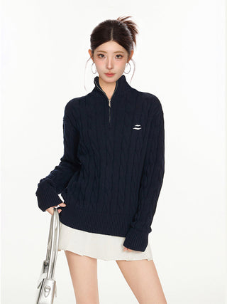 Quarter zip cable knit sweater