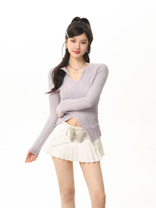 V-neck knit sweater and slim fit wool skirt suit