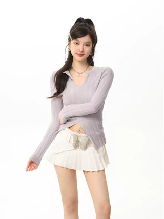 V-neck knit sweater and slim fit wool skirt suit