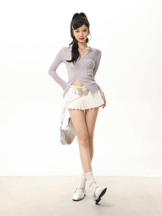 V-neck knit sweater and slim fit wool skirt suit
