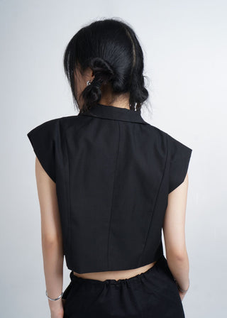 Shoulder pad suit vest