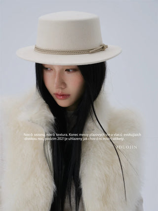white bowler hat