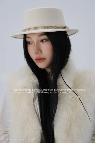 white bowler hat