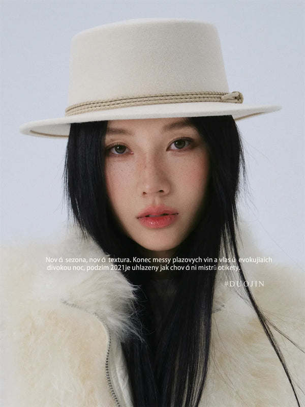 white bowler hat