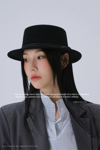 white bowler hat
