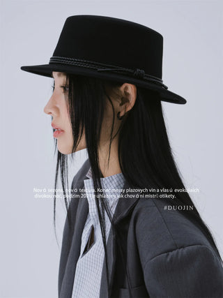 white bowler hat
