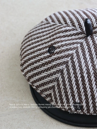 striped newsboy cap