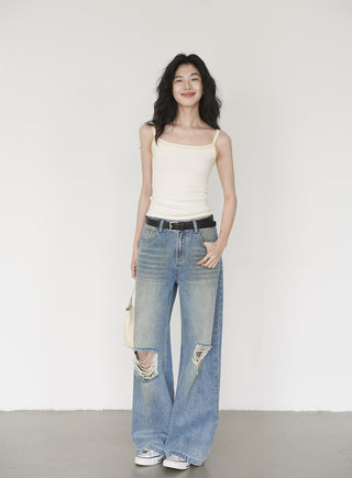 blue ripped jeans