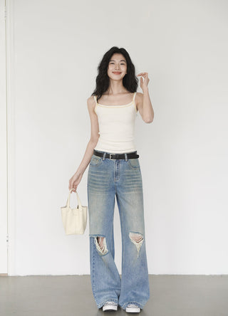 blue ripped jeans