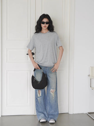 blue ripped jeans