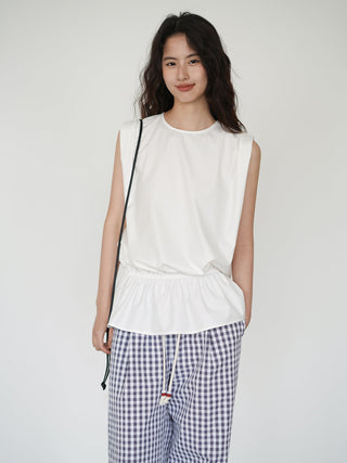 white sleeveless top