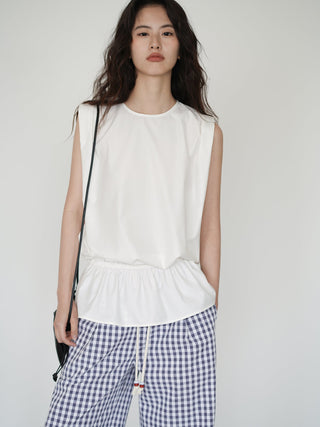white sleeveless top
