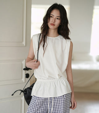 white sleeveless top