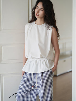 white sleeveless top