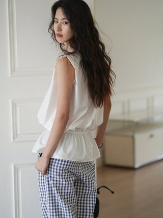 white sleeveless top