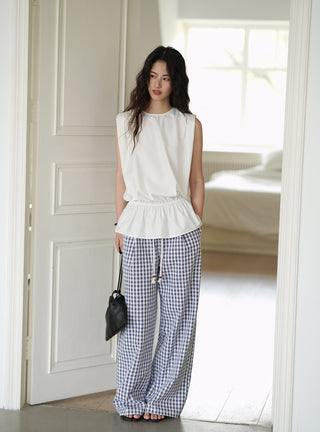 white sleeveless top