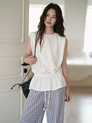 white sleeveless top
