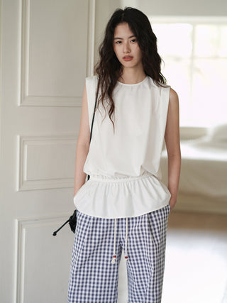 white sleeveless top