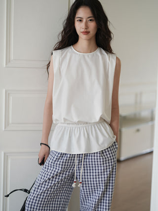 white sleeveless top