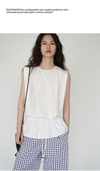 white sleeveless top