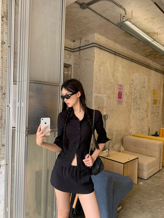 black A-line skirt