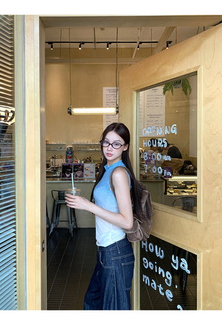 blue sleeveless top