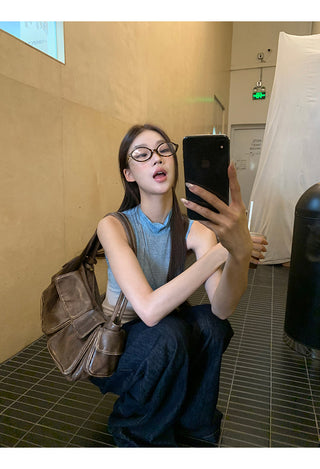 blue sleeveless top