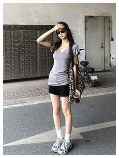 gray V-neck top
