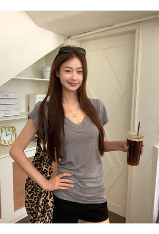 gray V-neck top