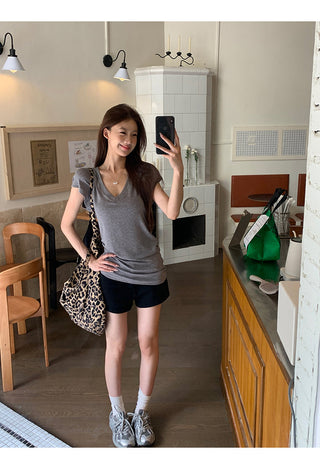 gray V-neck top