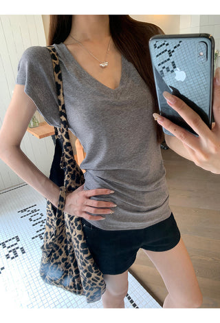 gray V-neck top