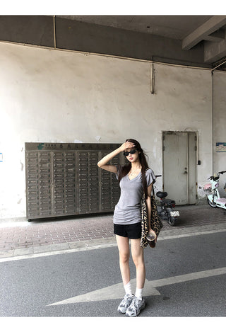 gray V-neck top