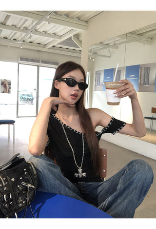 black shoulder top