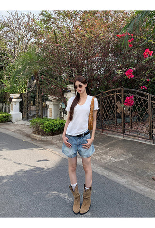 white V-neck top