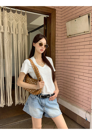 white V-neck top