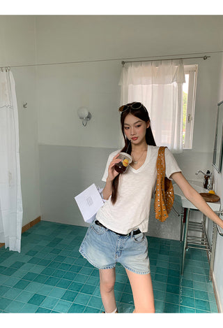 white V-neck top