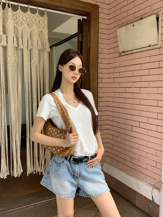 white V-neck top