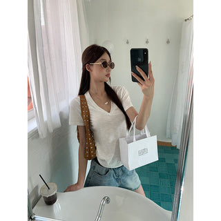white V-neck top