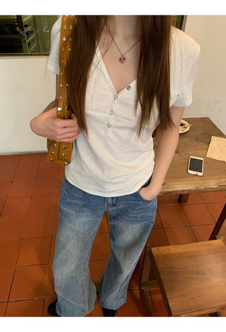 white V-neck top