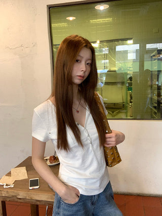 white V-neck top