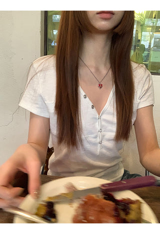 white V-neck top