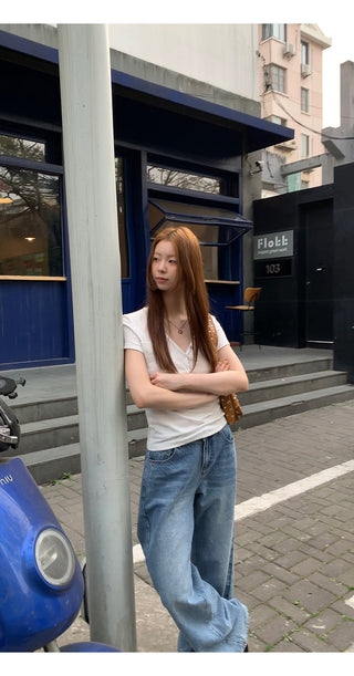 white V-neck top