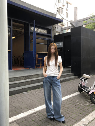 white V-neck top