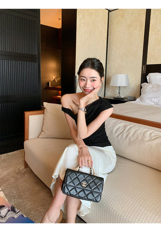 one-shoulder twist top