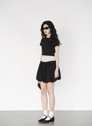 black mini skirt