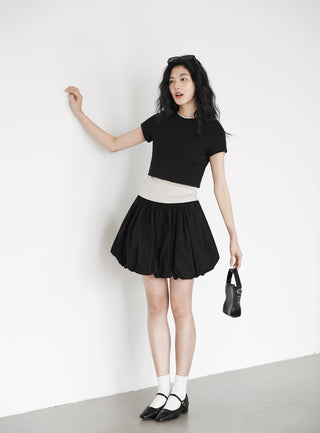 black mini skirt